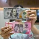 Rupiah Terus Melemah, Kini Tembus Rp18.066/Dolar AS